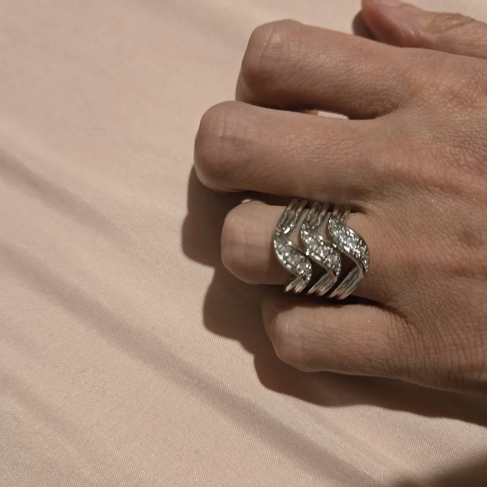 Silver and White Twisting Diamond Ring